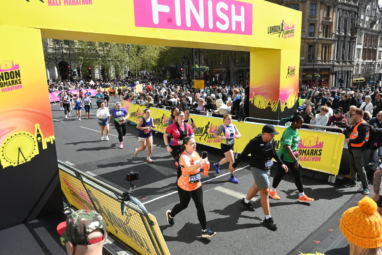 Challengers runner at the 2026 London Landmarks half marathon crossing the finish line